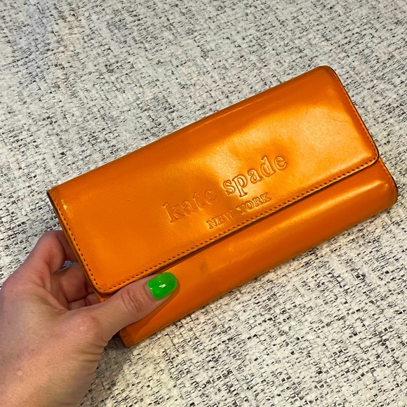 kate spade Handbags - Kate Spade orange leather wallet